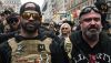 Enrique Tarrio, leader of the Proud Boys, at left, and group member Joe Biggs were sentenced to many years in federal prison. Stephanie Keith/Getty Images
