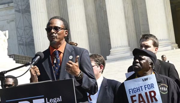 Taiwan Scott, who sued South Carolina over a new congressional map he said curbed Black voting power, speaking outside the Supreme Court in 2023. Shannon Finney/Getty Images for Rooted Logistics