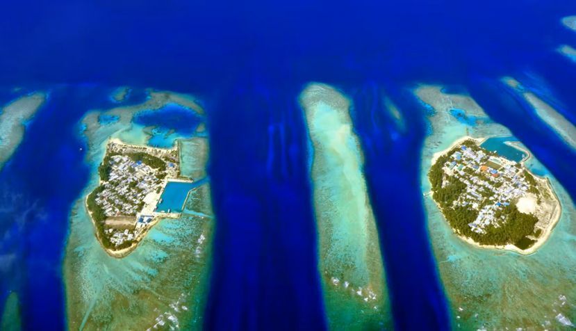 Vista aérea de islas de coral de Maldivas. Shutterstock / wilar