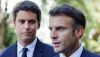 Gabriel Attal, alors ministre de l'Éducation, visite un lycée professionnel avec le chef de l'État à Argensol, près d'Orange. Ludovic Marin/AFP
