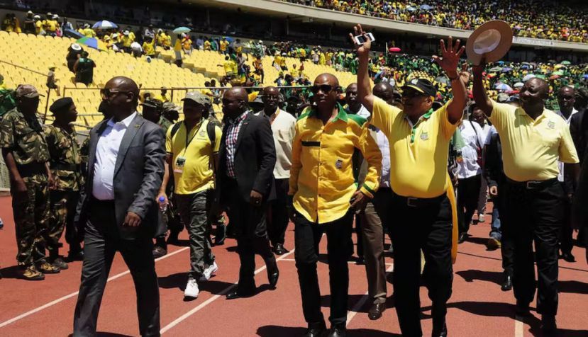 Supra Mahumapelo, former premier of North West Province, former president Jacob Zuma and current president Cyril Ramaphosa at an ANC celebration in 2016. Thulani Mbele/Sowetan/Gallo Images/Getty Images