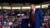 Former President Donald Trump makes his way to the stage during a rally in Erie, Pa., on July 29, 2023. Dustin Franz for The Washington Post via Getty Images