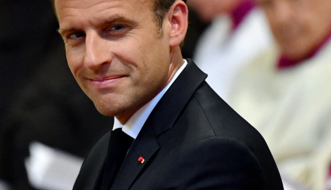 El presidente francés Emmanuel Macron, el 26 de junio de 2018, durante la ceremonia en la que tomó posesión del sitial de canónigo honorario en la Archibasílica de San Juan de Letrán, catedral del obispo de Roma, el Papa. Alberto Pizzoli/AFP