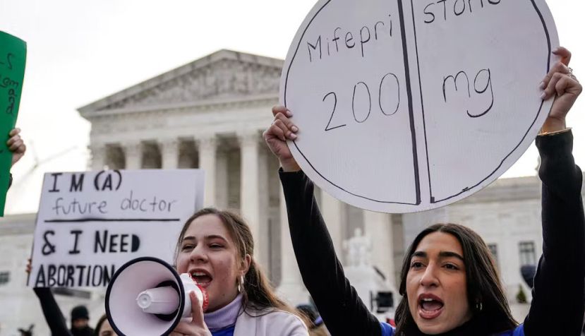 Pro-abortion rights activists rally in front of the Supreme Court on March 26, 2024, the day justices heard oral arguments about the use of mifepristone. Drew Angerer/AFP via Getty Images 