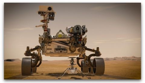 Fotografía cedida por la NASA de un dibujo artístico donde se muestra al helicóptero "Ingenuity" (adelante) que estará acoplado al nuevo vehículo espacial Rover (atrás), también conocido como "Perseverance" que serán los dos nuevos exploradores de la agencia en Marte. EFE/NASA/JPL-Caltech /NASA