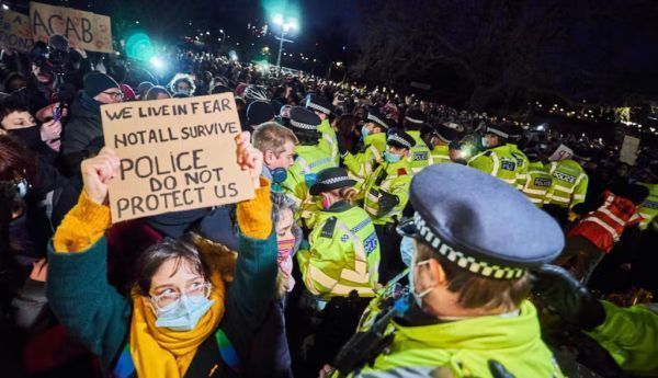 Protesters react to policing at a vigil for Sarah Everard. Vincenzo Lullo/Shutterstock