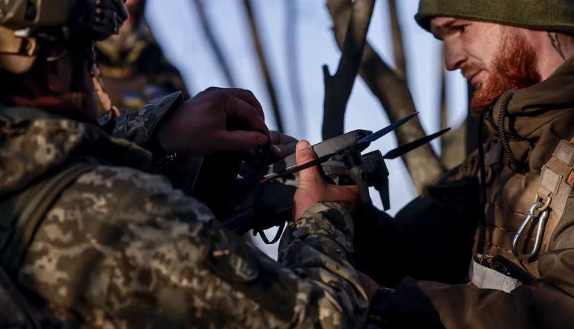 Ukrainian soldiers prepare to launch a drone. EPA-EFE/Hannibal Hansche