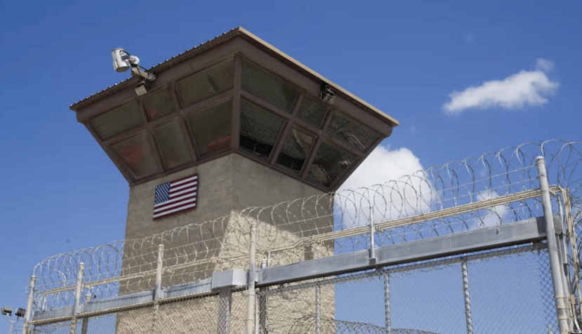 A control tower overlooks the Camp VI detention facility, at Guantánamo Bay Naval Base, Cuba. AP Photo/Alex Brandon
