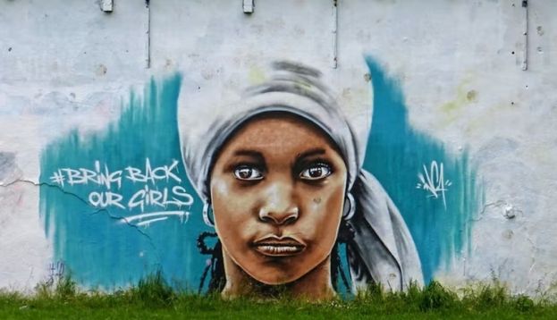 A UK mural employs the trending hashtag #BringBackOurGirls. Tim Green/Flickr, CC BY