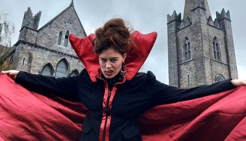 A participant of the ‘Stokerland’ event in Dublin, in front of St Patrick’s Cathedral, goes the extra mile, with an ornate costume and even stilts. Luisa Golz, Author provided