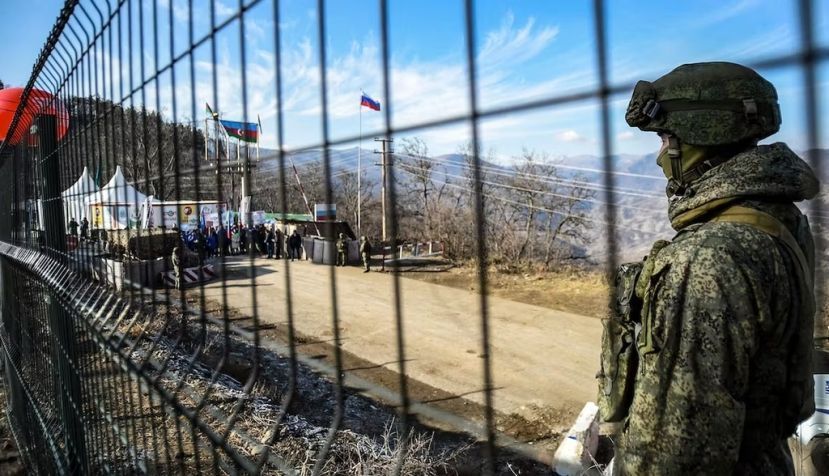 A Russian peacekeeper guards the Lachin corridor connecting Nagorno-Karabakh to Armenia. Tofik Babayev/AFP via Getty Images