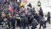 Pro-Trump protesters and police clash on Jan. 6, 2021, at the U.S. Capitol. Lev Radin/Pacific Press/LightRocket via Getty Images)