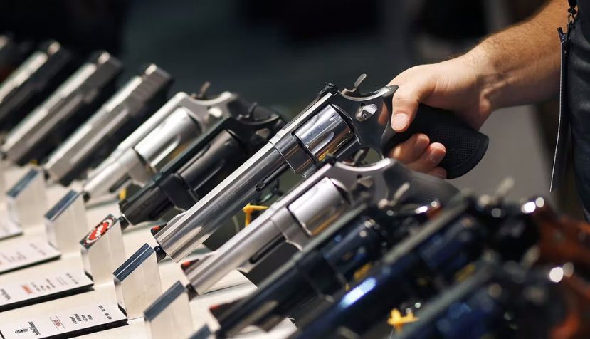 Smith &amp; Wesson handguns on display at the Shooting, Hunting and Outdoor Trade Show in Las Vegas, Jan. 19, 2016. AP Photo/John Locher