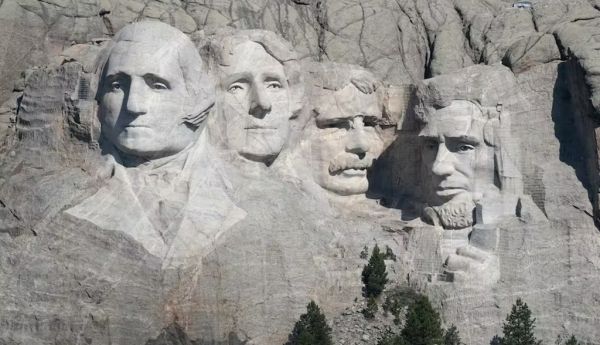 The sculpture of U.S. presidents George Washington, Thomas Jefferson, Theodore Roosevelt and Abraham Lincoln towers over the Black Hills at Mount Rushmore, near Keystone, S.D. Scott Olson/Getty Images News via Getty Images