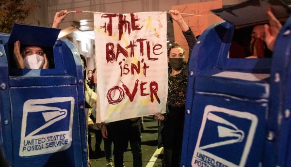 Protesters in support of counting all the mail-in votes gather outside of the Philadelphia Convention Center on Nov. 6, 2020. Chris McGrath via Getty Images