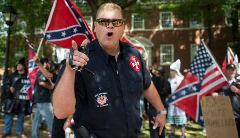 A member of the Ku Klux Klan shouts at counterprotesters during a July 2017 rally in Charlottesville, Va., calling for the protection of Southern Confederate monuments. Andrew Caballero-Reynolds/AFP via Getty Images