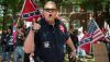 A member of the Ku Klux Klan shouts at counterprotesters during a July 2017 rally in Charlottesville, Va., calling for the protection of Southern Confederate monuments. Andrew Caballero-Reynolds/AFP via Getty Images