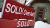 A for sale sign outside a home indicates that it has sold for over the asking price, in Ottawa, in March 2021. House prices and rents have become increasingly more unaffordable in Ontario over the past few years. THE CANADIAN PRESS/Justin Tang