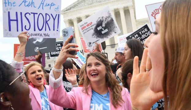 Anti-abortion protestors celebrate the overturning of Roe v. Wade outside the US Supreme Court on June 24. Olivier Douliery/AFP via Getty Images