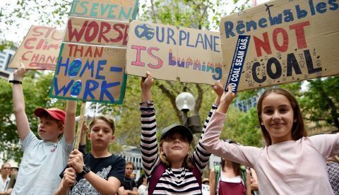 Protesters hold placards during the Climate Crisis National Day of Action rally in Sydney, Australia, 22 February 2020. EFE/EPA/BIANCA DE MARCHI