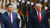 El presidente chino, Xi Jinping, y el presidente estadounidense, Donald Trump, inspeccionan una guardia de honor al inicio de la visita del presidente estadounidense a China, en mayo de 2026. EPA/Maxim Shemetov/pool