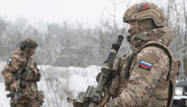 Russian army special forces inspect vehicles at a checkpoint in Zaporizhzhia, Ukraine, in February 2024. Sergey Nikonov/Shutterstock