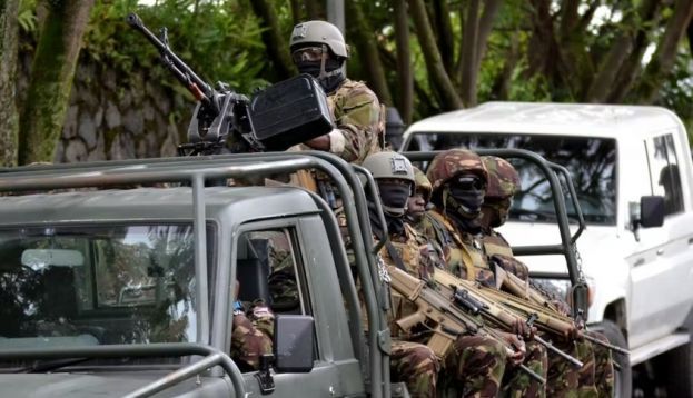 Military troops drive through Goma in North Kivu, eastern DRC, in November 2022. Augustin Wamenya/Anadolu Agency via Getty Images
