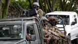 Military troops drive through Goma in North Kivu, eastern DRC, in November 2022. Augustin Wamenya/Anadolu Agency via Getty Images
