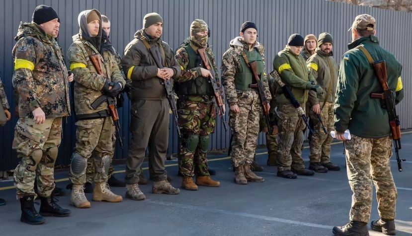 Russian President Putin thought he would overrun Ukraine in a few days. These military volunteers and fellow Ukrainians ‘had other ideas,’ writes the author. Mykhaylo Palinchak/SOPA Images/LightRocket via Getty Images