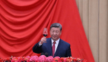 En Chine, les résultats du nouveau plan lancé par Xi Jinping (Ici le 30 septembre, pour la Journée des Martyrs) seront jugés principalement à l'aune de la hausse constatée du niveau de vie. Adek Berry/AFP