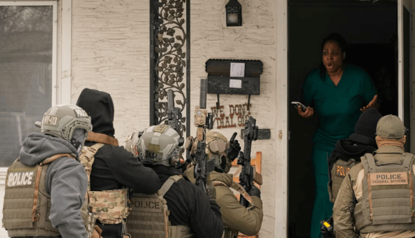 Teyana Gibson Brown, wife of Liberian immigrant Garrison Gibson, reacts after a federal immigration officer arrested her husband in a warrantless raid in Minneapolis, Jan. 11, 2026, in what a judge later ruled was a violation of Gibson’s Fourth Amendment rights. AP Photo/John Locher