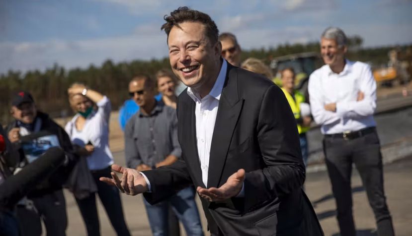 Tesla CEO Elon Musk, shown at an electric vehicle factory, called ESG ratings ‘a scam’ after an index dropped Tesla. Maja Hitij/Getty Images