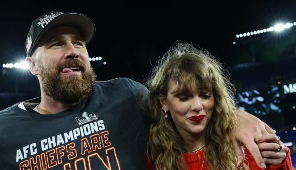  Travis Kelce celebrates with Taylor Swift on Jan. 28, 2024, after the Kansas City Chiefs defeated the Baltimore Ravens in the AFC championship game. Patrick Smith/Getty Images