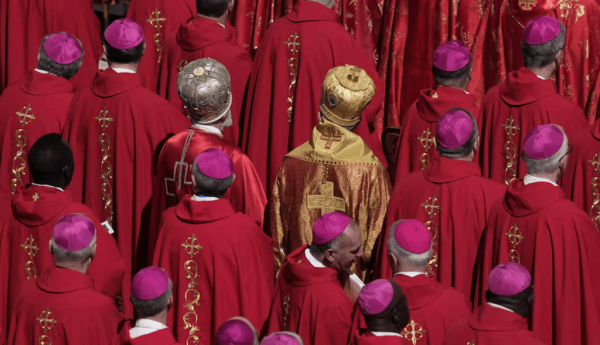 Cardinals stand during the funeral of Pope Francis in St. Peter’s Square at the Vatican on April 26, 2025. (AP Photo/Gregorio Borgia)