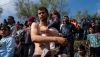 A Venezuelan asylum-seeker carries his daughter before they cross the Rio Grande into Brownsville, Texas. Veronica G. Cardenas/AFP via Getty Images