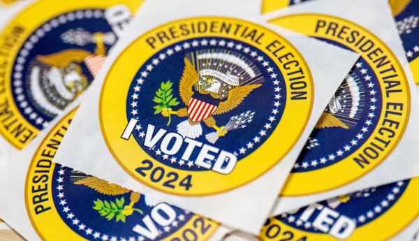 Stickers on a table on the first day of Virginia’s in-person early voting, Sept. 20, 2024, in Arlington. Andrew Harnik/Getty Images