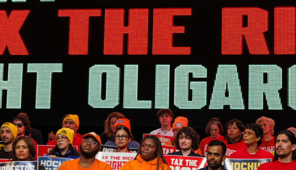 People attend a Tax The Rich rally hosted by the Democratic Socialists of America in the Bronx, N.Y., on March 29, 2026. Jason Alpert-Wisnia/Hans Lucas/AFP via Getty Images