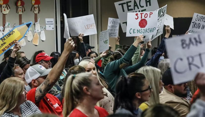 An even mix of proponents and opponents to teaching critical race theory attend a Placentia-Yorba Linda school board meeting in California. Robert Gauthier/Los Angeles Times via Getty Images
