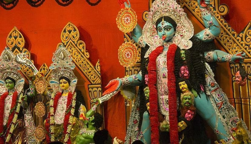 People admire a massive statue of the Hindu goddess Kali. Jerry Redfern/LightRocket via Getty Images