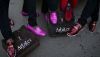 Izikhothane display their expensive Italian shoes - which they sometimes destroy in public. Per-Anders Pettersson/Getty Images