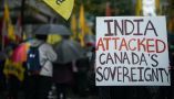 A person holds a sign during a protest outside the Indian consulate in Vancouver in September 2023. THE CANADIAN PRESS/Darryl Dyck