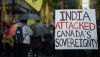 A person holds a sign during a protest outside the Indian consulate in Vancouver in September 2023. THE CANADIAN PRESS/Darryl Dyck