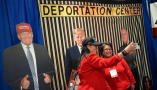 Attendees take selfies at the Conservative Political Action Conference in Oxon Hill, Md., on Feb. 20, 2025. Andrew Harnick/Getty Images 