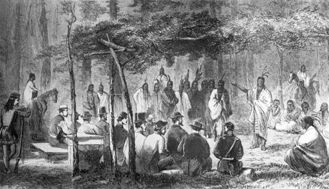 Asamblea en Medicine Lodge Creek. Este dibujo de J. Howland, originalmente impreso en el Harper's Weekly, muestra la reunión entre representantes del Gobierno de Estados Unidos y cinco tribus indias en Medicine Creek Lodge, Kansas, en 1867. Biblioteca del Congreso. Dominio Público.