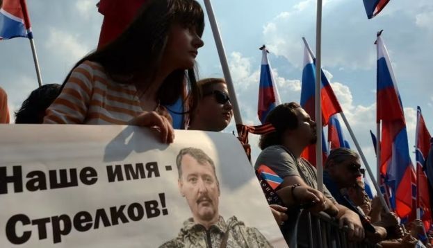 In 2014, protesters chant “Our name is Strelkov,” in solidarity with the military veteran, Igor Girkin. Also known by the alias Igor Strelkov (“shooter”), he played a key role in the annexation of Crimea and the war in Donbas. Vasily Maximov/AFP
