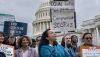 Activists call for ethics reform in the Supreme Court at the U.S. Capitol in Washington on May 2, 2023. AP Photo/J. Scott Applewhite