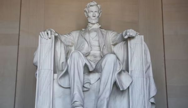 A statue of Abraham Lincoln, the 16th president of the United States, sits in the Lincoln Memorial in Washington. Historians consistently have given Lincoln, the Great Emancipator, their highest rating because of his leadership during the Civil War. Jakub Porzycki/NurPhoto via Getty Images