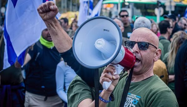 A member of Israel’s military reserves takes part in a protest on March 16, 2023 in Bnei Brak, a city east of Tel Aviv. Photo by Eyal Warshavsky/SOPA Images/LightRocket via Getty Images