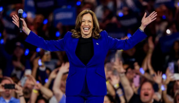 Kamala Harris laughs at Donald Trump during her convention speech on Aug. 22, 2024. Jacek Boczarski/Anadolu via Getty Images