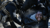 ICE officers and federal agents clash with protesters in south Minneapolis after Alex Pretti was fatally shot by federal agents on Jan. 24, 2026. Richard Tsong-Taatarii/The Minnesota Star Tribune